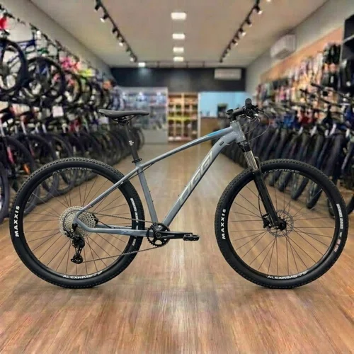 Bicicleta Oggi Aro 29 7.2 Deore 12v Grafite com Azul e Cinza tam 17