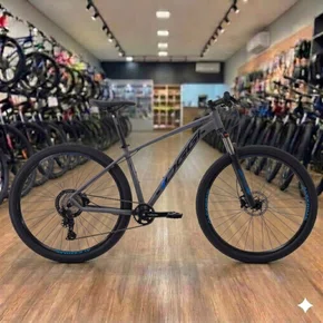 Bicicleta Oggi Aro 29 Hacker HDS 8v Shimano Essa Grafite com Azul e Preto Tam 17